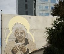 A painted woman on a wall in Christchurch.